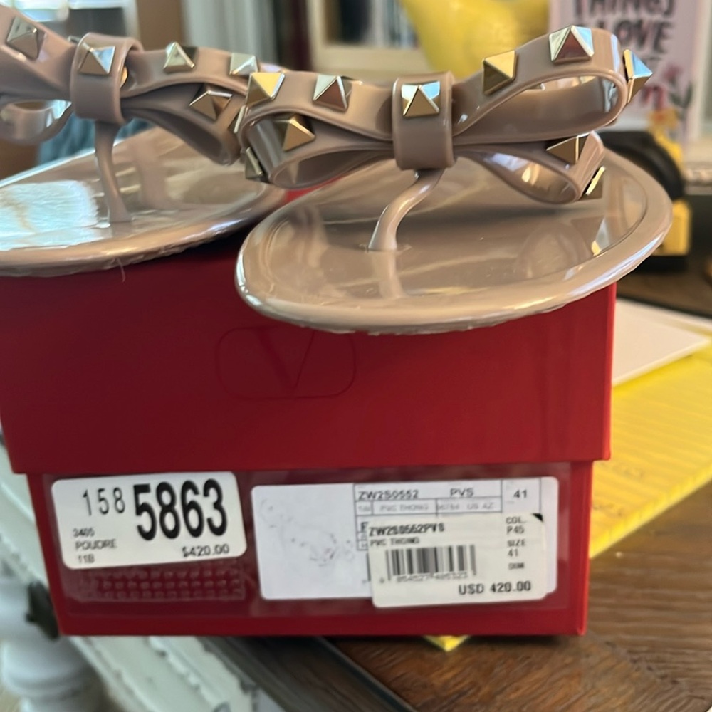 Brand new Valentino sandals color is Poudre or tan like size 41 with box